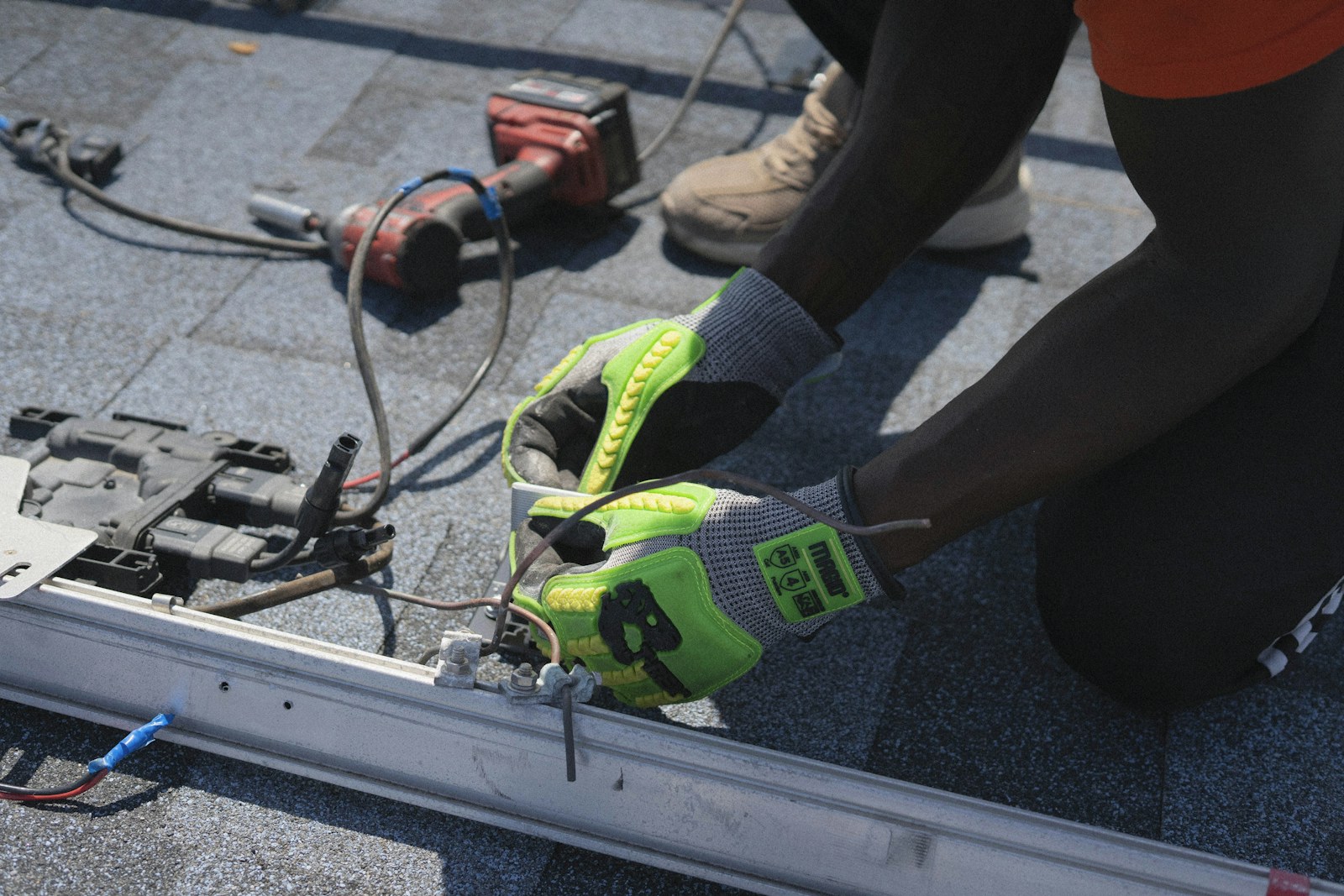 Technician wiring solar installation components